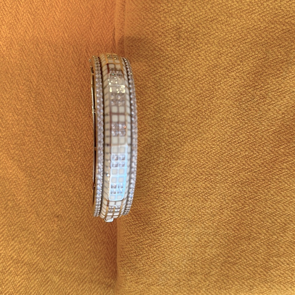 Lumiere Bangle. . stones set in enameled sterling silver. M 925 sterling silver
